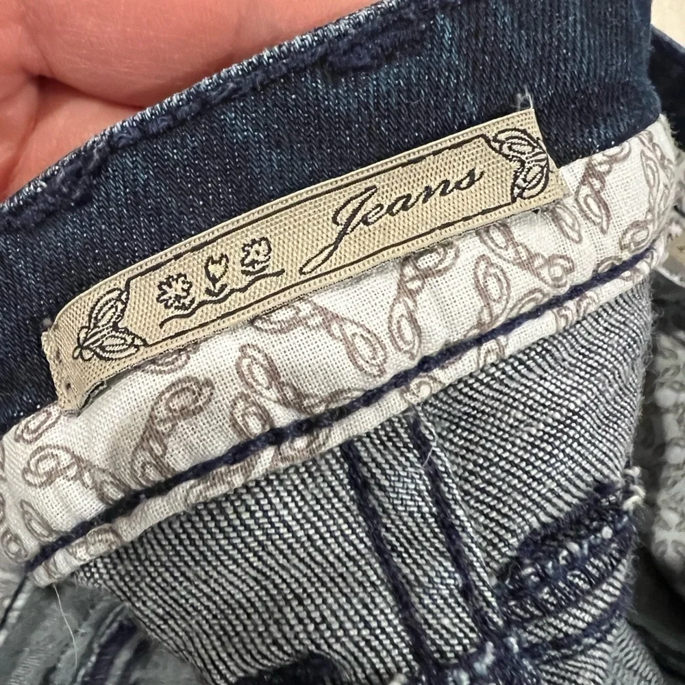 Vintage designer jeans size 28. Not sure the brand